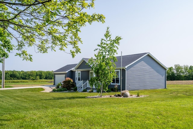 30877 County Road 687, Bangor, MI 49013 - ranch-style home with an attached garage, a front yard, and driveway