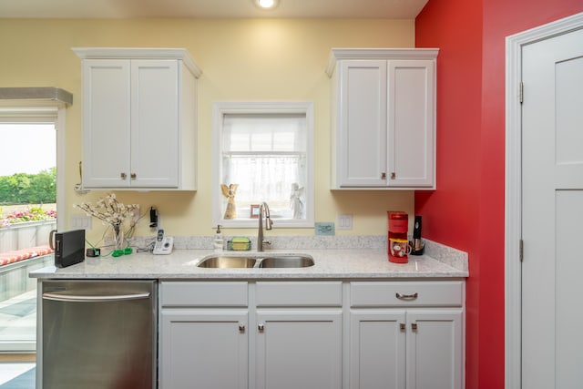 30877 County Road 687, Bangor, MI 49013 - kitchen with stainless steel dishwasher, a sink, white cabinets, light stone counters, and recessed lighting