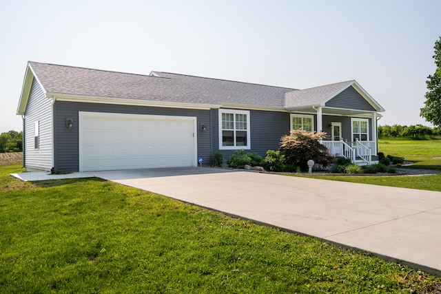 30877 County Road 687, Bangor, MI 49013 - single story home featuring an attached garage, concrete driveway, a porch, a front yard, and a shingled roof