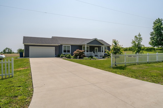 30877 County Road 687, Bangor, MI 49013 - ranch-style home featuring covered porch, concrete driveway, and an attached garage