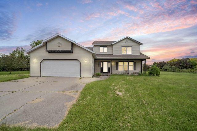 2045 E Baldwin Rd, Grand Blanc, MI 48439 - traditional-style home with a front yard, covered porch, concrete driveway, a garage, and a shingled roof