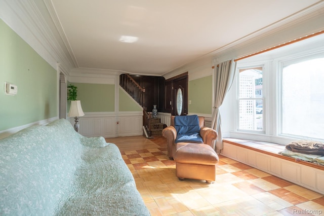 511 N Byfield St, Westland, MI 48185 - living area featuring stairway, ornamental molding, and a wainscoted wall