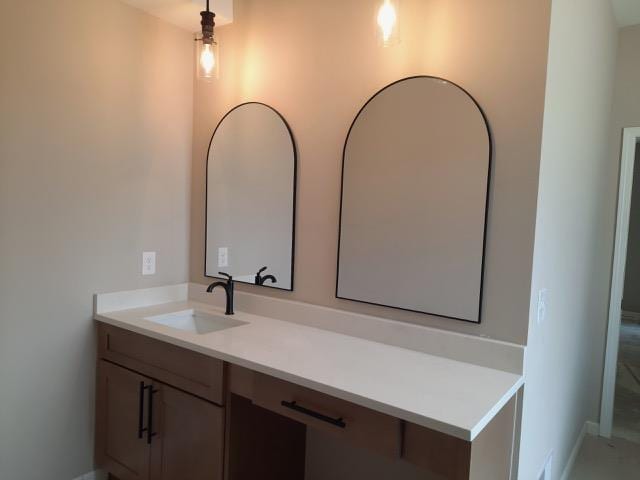 16445 Sleepy Hollow Dr, Fenton, MI 48430 - bathroom featuring vanity and baseboards