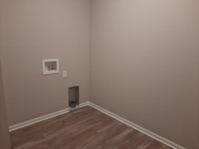 16445 Sleepy Hollow Dr, Fenton, MI 48430 - washroom featuring washer hookup and dark wood finished floors