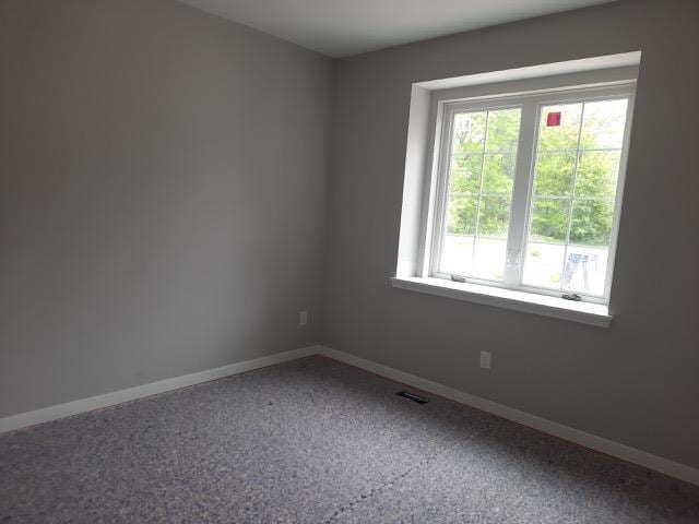 16445 Sleepy Hollow Dr, Fenton, MI 48430 - empty room with baseboards and carpet floors