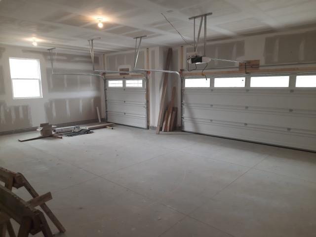 16445 Sleepy Hollow Dr, Fenton, MI 48430 - garage featuring a garage door opener