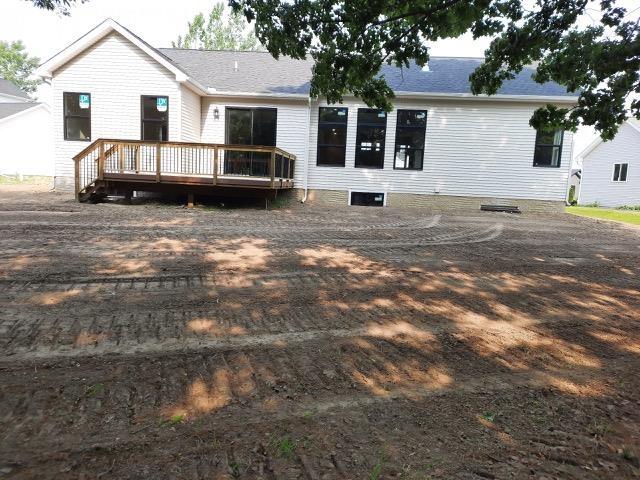 16445 Sleepy Hollow Dr, Fenton, MI 48430 - back of house with a wooden deck