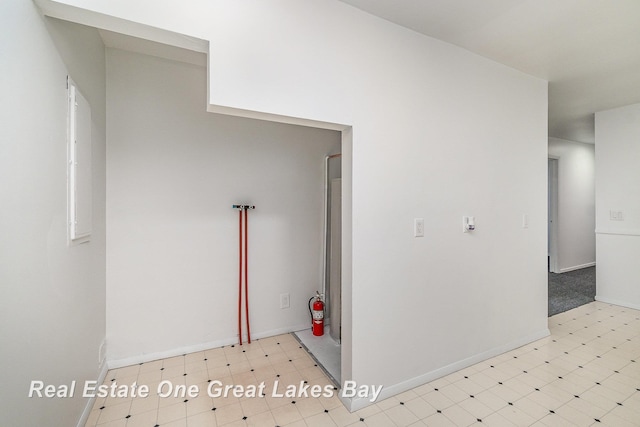 4675 E Parish Rd, Midland, MI 48642 - washroom featuring tile patterned floors and baseboards