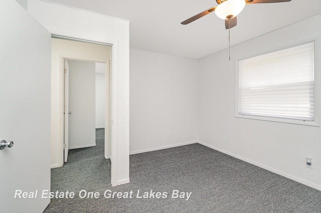 4675 E Parish Rd, Midland, MI 48642 - carpeted empty room featuring a ceiling fan and baseboards