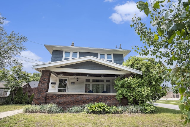 75 Diamond Ave NE, Grand Rapids, MI 49503 - american foursquare style home featuring covered porch