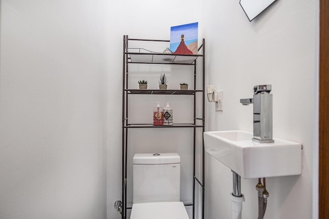 75 Diamond Ave NE, Grand Rapids, MI 49503 - bathroom with toilet and a sink