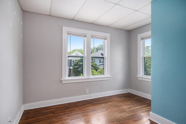 75 Diamond Ave NE, Grand Rapids, MI 49503 - spare room with wood finished floors and baseboards