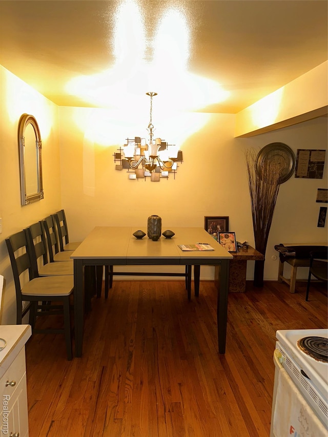 25301 5 Mile Rd, Detroit, MI 48239 - dining room featuring dark wood finished floors and a chandelier