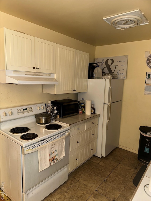 25301 5 Mile Rd, Detroit, MI 48239 - kitchen featuring white appliances, under cabinet range hood, and dark tile patterned flooring