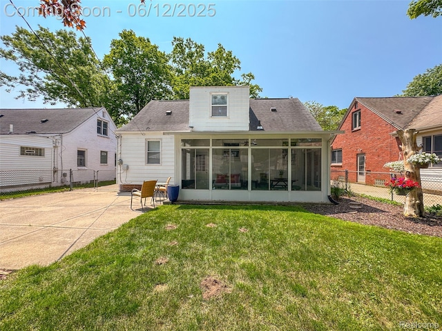 2195 Pembroke Rd, Birmingham, MI 48009 - back of property with a sunroom and a patio