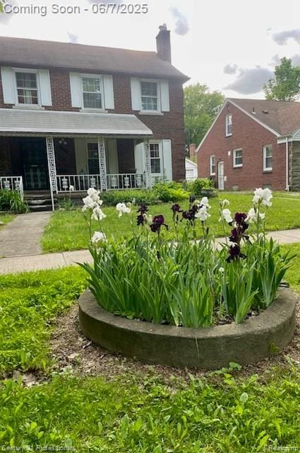 14603 Greenview Rd, Detroit, MI 48223 - back of house featuring a porch and a chimney