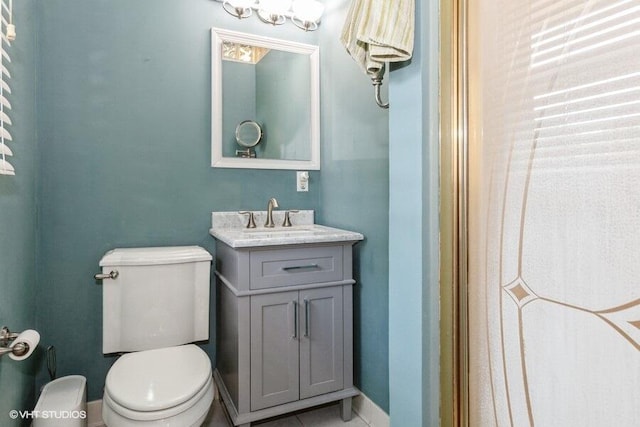 1787 Trafalgar Dr, Saint Joseph, MI 49085 - half bath featuring toilet, vanity, and baseboards