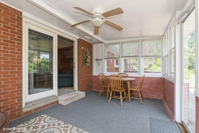 1787 Trafalgar Dr, Saint Joseph, MI 49085 - sunroom with ceiling fan and outdoor dining area