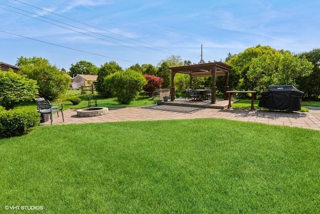 1787 Trafalgar Dr, Saint Joseph, MI 49085 - view of green lawn with an outdoor fire pit, a pergola, and a patio