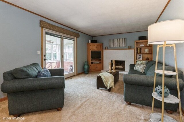 1787 Trafalgar Dr, Saint Joseph, MI 49085 - living room featuring ornamental molding, light colored carpet, and a fireplace