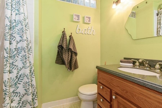 1787 Trafalgar Dr, Saint Joseph, MI 49085 - full bathroom with vanity, toilet, tile patterned flooring, and curtained shower