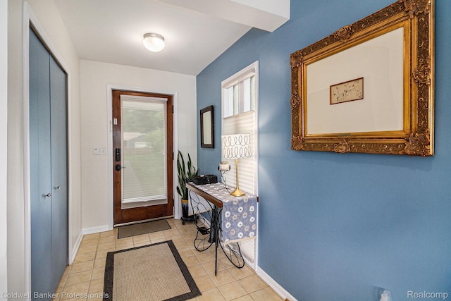 1704 Clark Lake Rd, Brighton, MI 48114 - tiled foyer entrance featuring baseboards