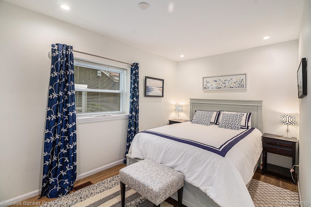 1704 Clark Lake Rd, Brighton, MI 48114 - bedroom featuring wood finished floors, baseboards, and recessed lighting