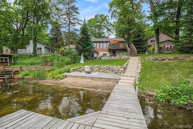 1704 Clark Lake Rd, Brighton, MI 48114 - dock with stairs, a lawn, a deck with water view, and a residential view
