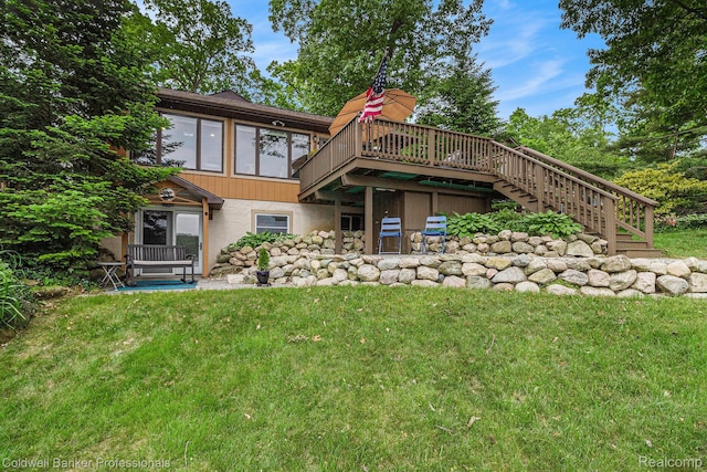 1704 Clark Lake Rd, Brighton, MI 48114 - back of property featuring stairs, a deck, a yard, and stucco siding