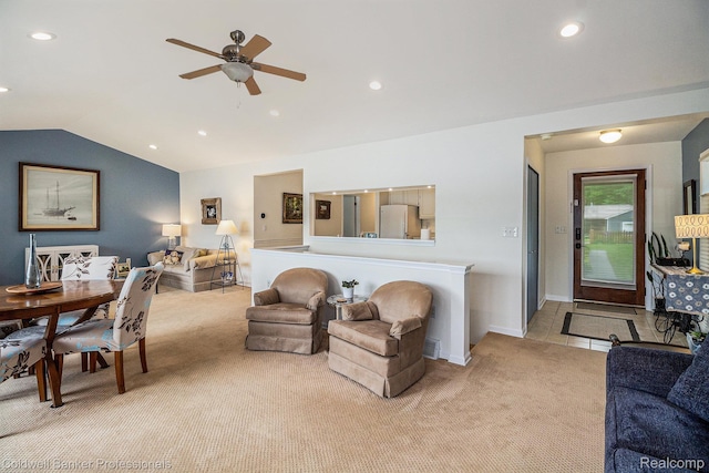 1704 Clark Lake Rd, Brighton, MI 48114 - living area featuring light colored carpet, a ceiling fan, vaulted ceiling, recessed lighting, and baseboards