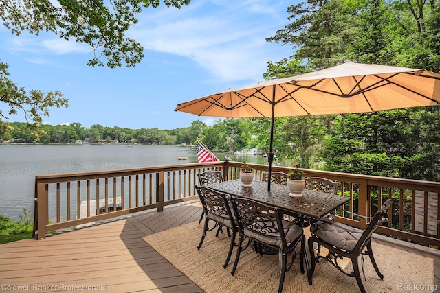 1704 Clark Lake Rd, Brighton, MI 48114 - wooden deck featuring a water view and outdoor dining area