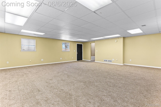 3428 Lennon Rd, Flint, MI 48507 - carpeted spare room with a paneled ceiling and baseboards
