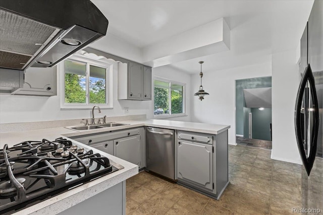 2985 Lacota Rd, Farmington, MI 48328 - kitchen with black appliances, a sink, gray cabinets, range hood, and a peninsula