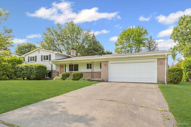 2985 Lacota Rd, Farmington, MI 48328 - split level home with brick siding, a garage, driveway, and a chimney