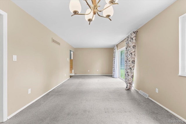 2985 Lacota Rd, Farmington, MI 48328 - unfurnished living room featuring carpet floors, a chandelier, and baseboards