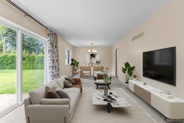 2985 Lacota Rd, Farmington, MI 48328 - living room featuring a chandelier and light carpet