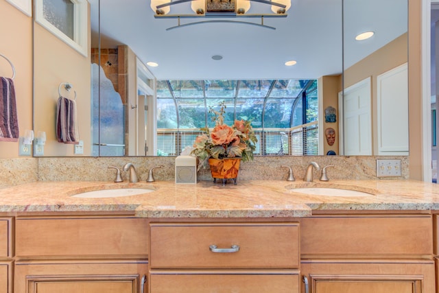 4298 Braeburn Ct, Norton Shores, MI 49441 - bathroom featuring double vanity