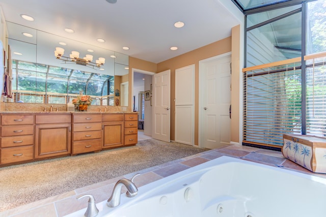 4298 Braeburn Ct, Norton Shores, MI 49441 - bathroom with plenty of natural light, double vanity, a whirlpool tub, and recessed lighting