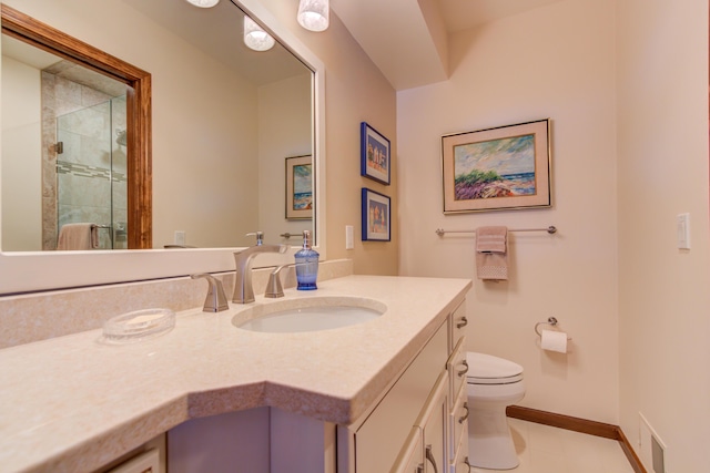 4298 Braeburn Ct, Norton Shores, MI 49441 - full bath featuring vanity, toilet, a stall shower, baseboards, and tile patterned floors