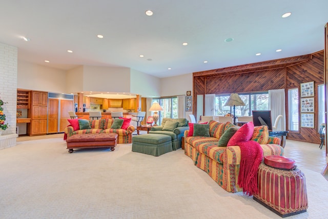 4298 Braeburn Ct, Norton Shores, MI 49441 - living room with recessed lighting, light colored carpet, and a towering ceiling