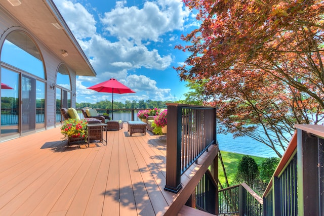 4298 Braeburn Ct, Norton Shores, MI 49441 - wooden deck with a water view