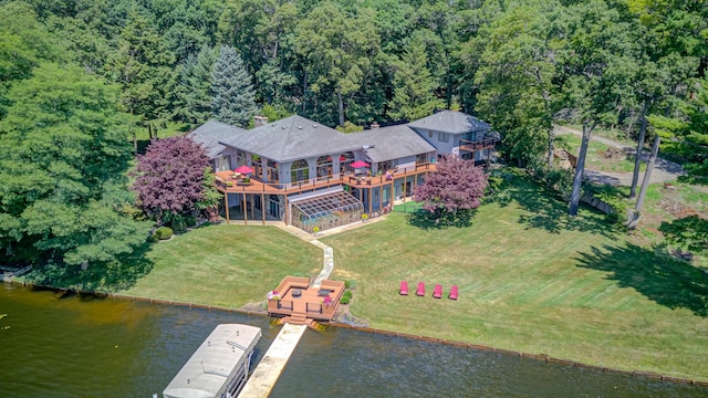 4298 Braeburn Ct, Norton Shores, MI 49441 - aerial view of property and surrounding area featuring a large body of water and a heavily wooded area