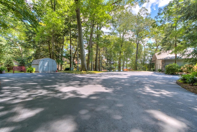 4298 Braeburn Ct, Norton Shores, MI 49441 - view of asphalt driveway