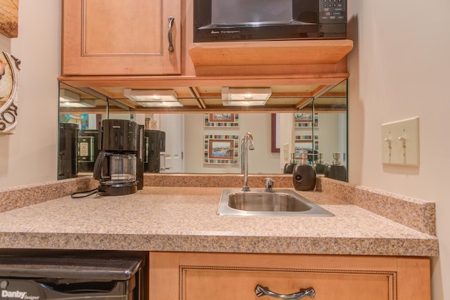 4298 Braeburn Ct, Norton Shores, MI 49441 - kitchen featuring a sink and light countertops