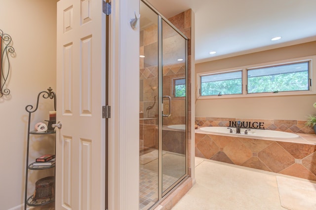 4298 Braeburn Ct, Norton Shores, MI 49441 - full bathroom with a bath, a stall shower, and recessed lighting