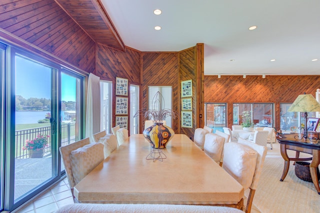 4298 Braeburn Ct, Norton Shores, MI 49441 - dining area featuring wood walls, recessed lighting, light tile patterned floors, and a water view