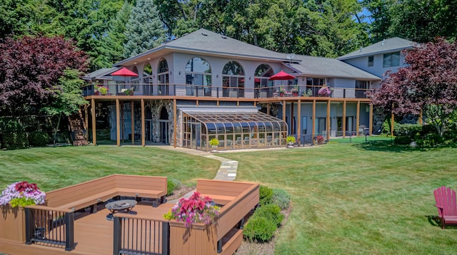 4298 Braeburn Ct, Norton Shores, MI 49441 - rear view of property with a deck and a yard
