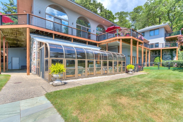 4298 Braeburn Ct, Norton Shores, MI 49441 - rear view of property featuring a sunroom