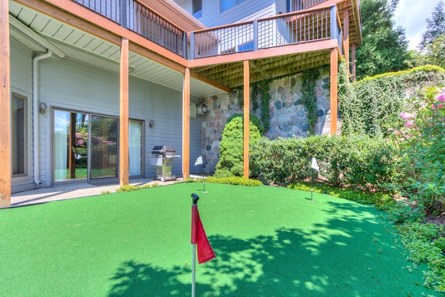 4298 Braeburn Ct, Norton Shores, MI 49441 - view of patio / terrace featuring a putting area and a grill