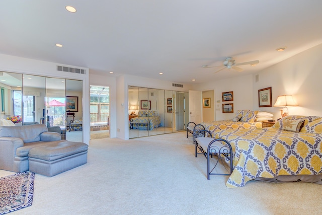 4298 Braeburn Ct, Norton Shores, MI 49441 - carpeted bedroom with two closets and recessed lighting